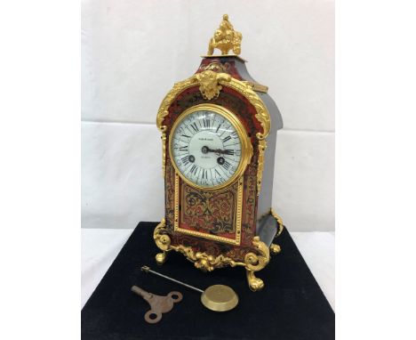 A Boullework clock, with ceramic dial, eight-day movement: matching pendant number to the movement.