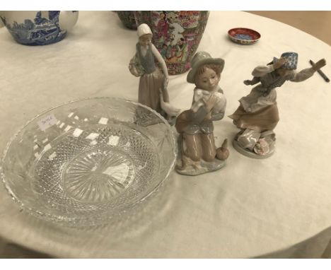 A Nao figure; together with two others and a Stuart crystal bowl