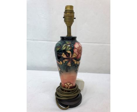 A small Moorcroft baluster-shaped lamp in 'Oberon' pattern by R Bishop