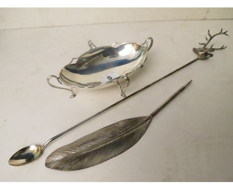 An Edwardian silver bon bon dish, silver plated stags head ladle and a Tiffany silver pen