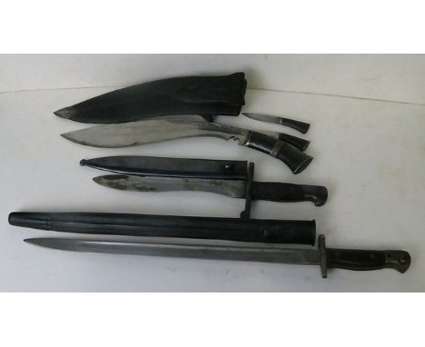 An early 20th century Australian bayonet in metal sheath, the wooden handle stamped AUSTRALIA, the Wilkinson blade stamped 19