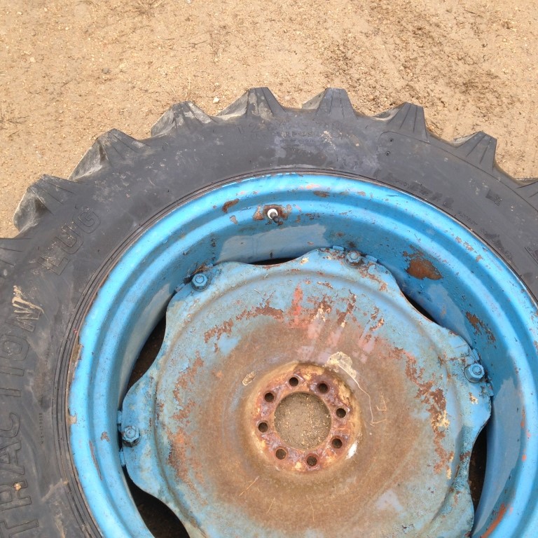 2 Tractor Tires 13.6x28 on Ford Rims and Centers