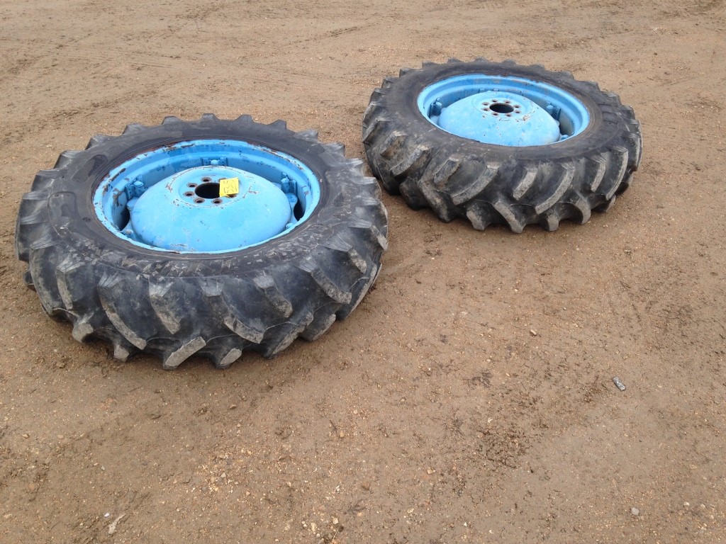 2 Tractor Tires 13.6x28 on Ford Rims and Centers