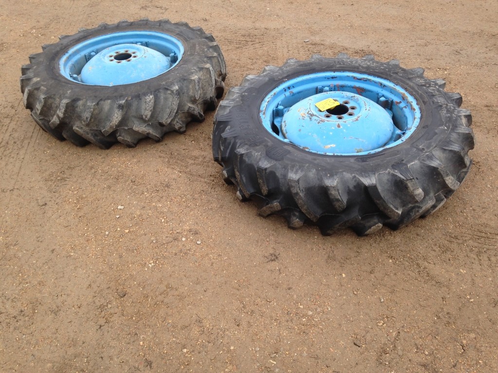 2 Tractor Tires 13.6x28 on Ford Rims and Centers