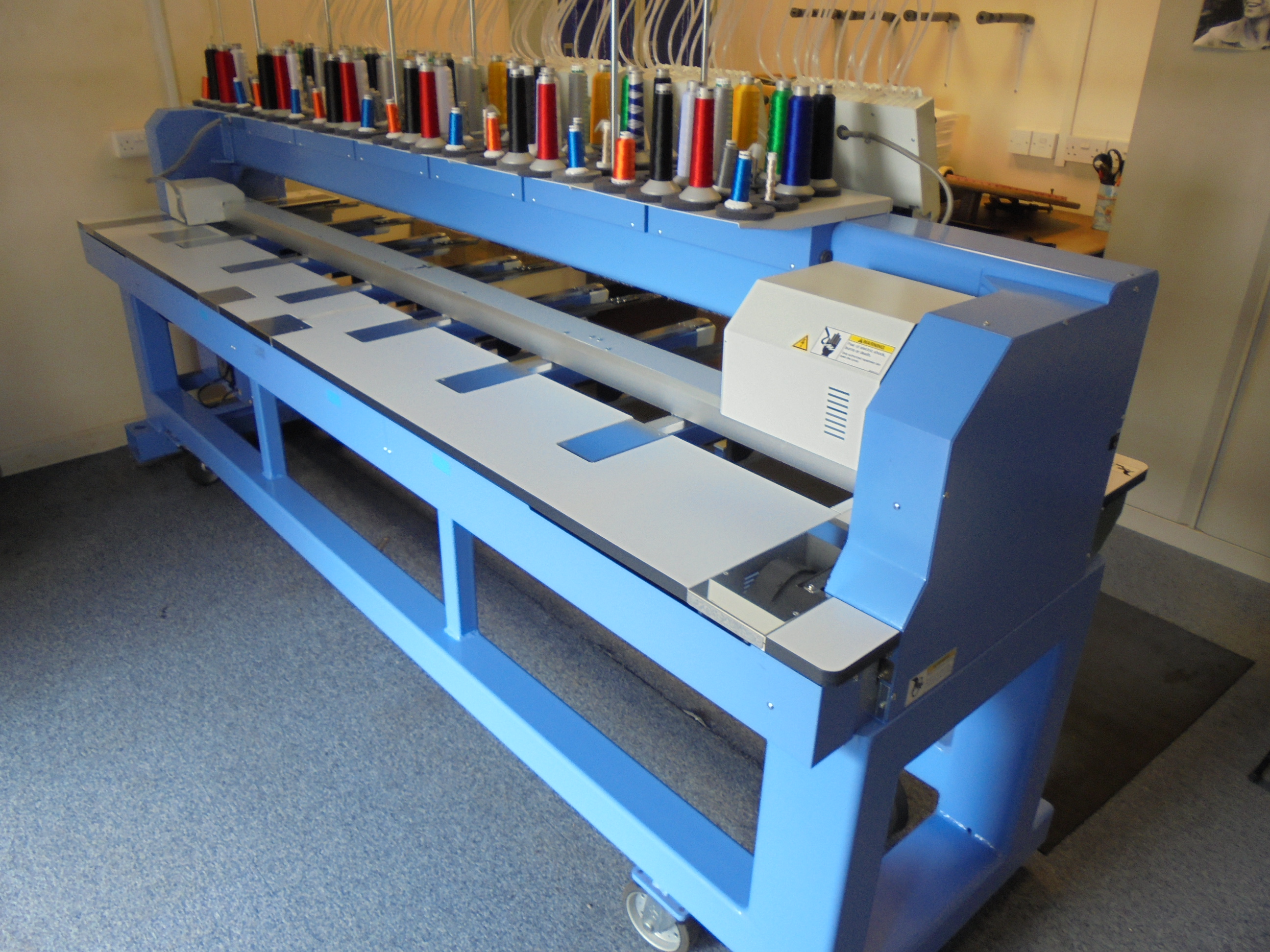 Happy Japan Inc' 6 Head Embroidery Machine, Model HCR2150645, S/N 1006007. 6 Heads with 15 Need