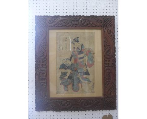 An early 20th Century Japanese coloured print of two figures, in a carved frame decorated with dragons, H.50cm W.43cm 