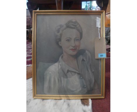 A 20th Century oil on board portrait of a lady with blonde hair, signed lower right, framed and glazed, H.50cm W.41cm 