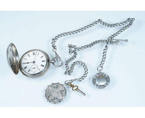 19th Century Silver hallmarked full hunter pocket watch having engine turned case with vacant armorial crest to centre. Mount