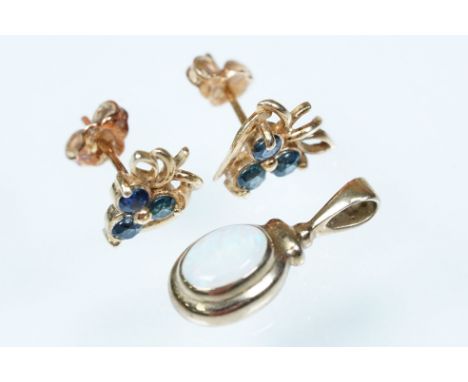 9ct gold and opal pendant set with an oval copal cabochon (hallmarked Sheffield 1999), together with a pair of yellow metal a