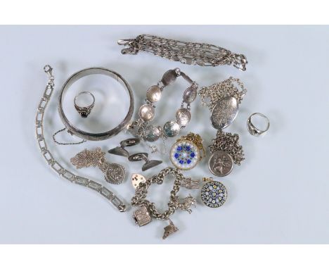 Collection of silver jewellery to include a pair of Arne Johansen Danish silver cufflinks, silver charm bracelet, silver flat