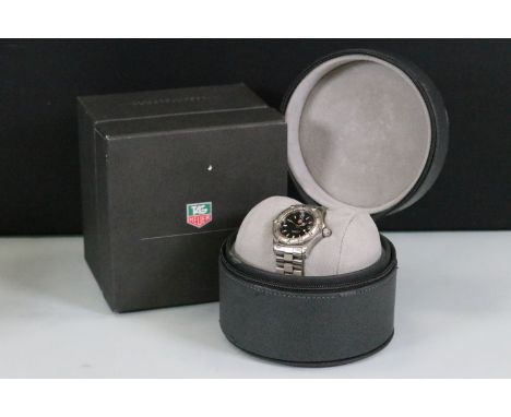 Tag Heuer professional 200 meters stainless steel wrist watch having a black face with luminous baton markers to the chapter 