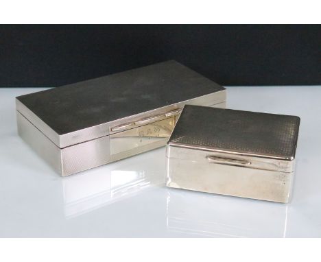 Two silver hallmarked cigarette boxes to include an engine turned box (hallmarked Birmingham 1951, A Wilcox), a smaller examp