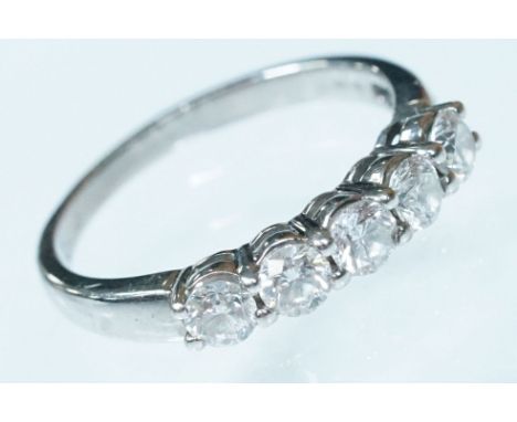 18ct white gold and diamond five stone ring. The ring being set with five round brilliant cut diamonds in prong settings on a
