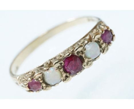 9ct gold opal and ruby five stone ring. The ring being set with three round cut rubies with two round opal cabochons. Hallmar