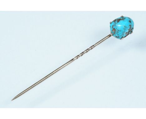 19th Century Victorian turquoise and gold stick pin. The pin being set with a polished turquoise to the head, and set within 