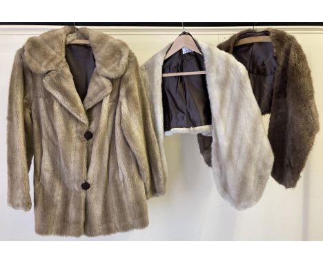 A vintage light brown faux fur jacket by Dynamink. Together with a cream faux fur stole also by Dynamink and a real fur stole