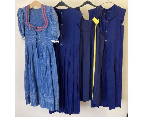 4 vintage theatre costume short sleeved day dresses, in blue tones. 