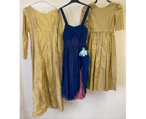 3 vintage theatre costume dresses in varying colours and styles. To include 2 gold coloured dresses. 