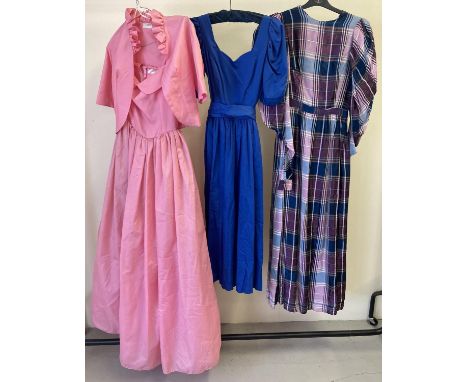 3 vintage 1980's dresses. To include a navy blue Laura Ashley dress and bright spaghetti strapped pink dress with matching bo