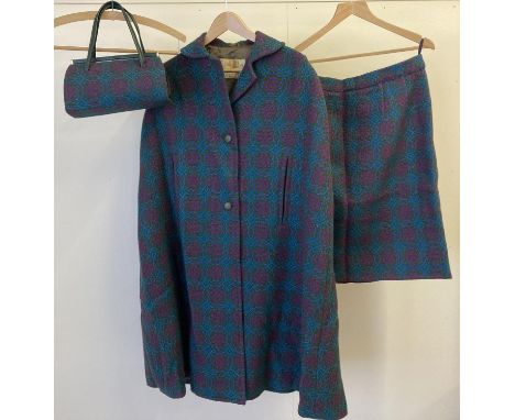 A vintage "Real Welsh Tapestry Eclipse Tailored" pure wool matching cape, skirt and handbag. In green, blue and purple geomet