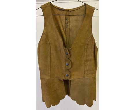 A vintage 1960's tan coloured suede waistcoat with scalloped detail and press stud fastening. 