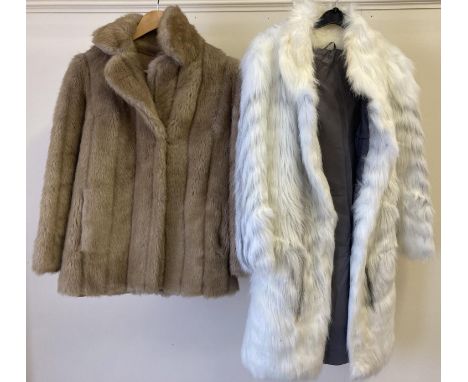A ladies white faux fur mid length open fronted coat (size 10) together with a light brown faux fur jacket with hook and eye 