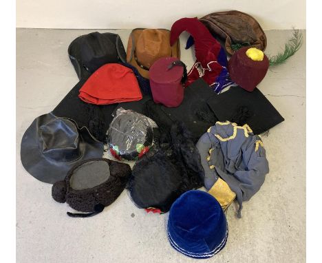 A collection of assorted vintage and theatre costume hats. In varying colours and styles. 