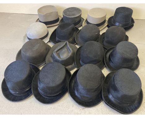 A collection of assorted vintage and modern top hats and bowler hats. 