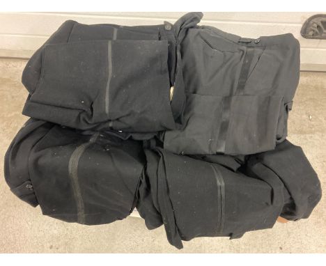 A large quantity of vintage tuxedo trousers. 