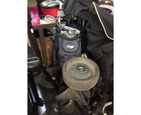 A GOLF BAG AND CLUBS INC PING AND A POWER CADDY