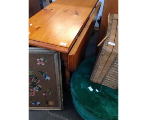 A PINE DROP LEAF YABLE AND A GREEN POUFFE