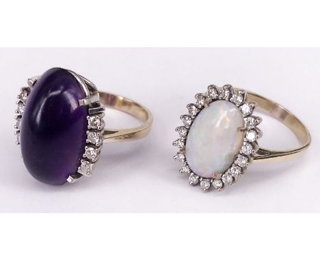 2 Ringe, 750er WG (geprüft), mit Amethyst und Opal (best.) sowie insg. 28 Diamanten, RG56 und RG59, 13,95 g. 