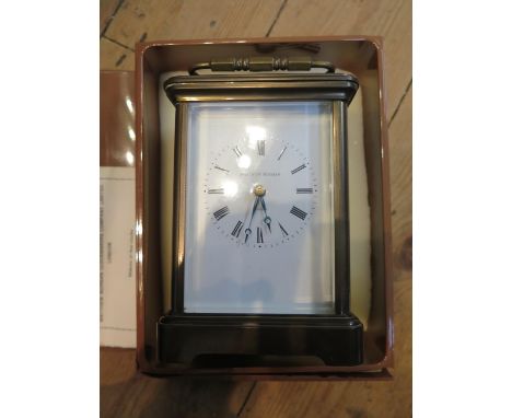 A Matthew Norman brass carriage clock, of conventional form with enamel dial, the twin train movement numbered 1750 and strik
