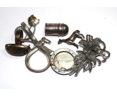 A collection of silver items to include miniature sugar shaker, 29 mm high, a 1920s round photo frame decorated to edge in en