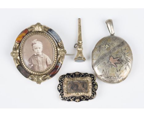 A Victorian gold cased and bloodstone watch key with a seal terminal, length 4.3cm, a William IV black enamelled shaped recta
