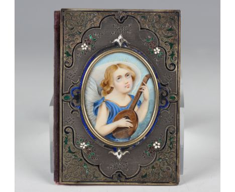 A 19th century Continental silver parcel gilt and enamelled aide-mémoire, the front inset with an oval portrait miniature of 