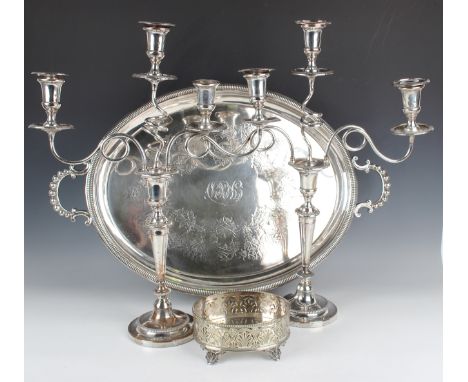 A Victorian plated oval tea tray, engraved with fruiting vines between beaded scroll handles, length 75.5cm, and a group of o