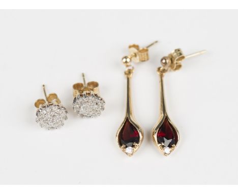 A pair of 9ct gold, garnet and colourless gem set drop shaped pendant earrings with post and butterfly fittings, length 2.8cm