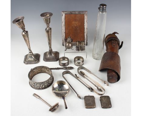 A collection of assorted silver items, including a rectangular photograph frame, Birmingham 1920 by Henry Matthews, height 17