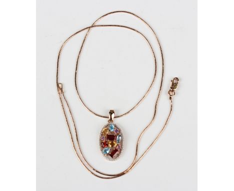 A Russian gold and varicoloured gemstone set oval pendant, mounted with rectangular, oval, circular and pear cut gemstones, i