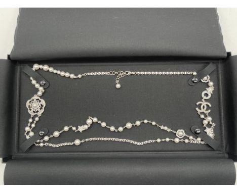 Chanel White Pearl Long Necklace. 
Absolutely amazing condition, as new. The length of this necklace from end to end is 96cm.