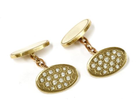 A pair of 9ct gold oval diamond chain link cufflinks, a cluster of brilliant cut diamonds, claw set to an engine turned borde