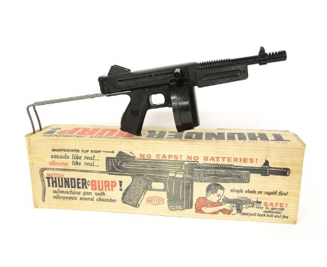 A Mattel 'Thunder Burp' machine gun, in original box