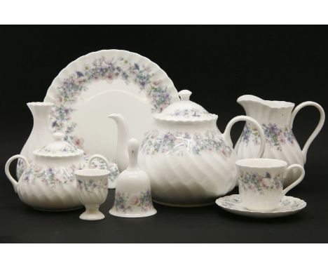 A quantity of Wedgwood 'Angela' pattern dinner ware and tea ware, comprising teapot, cream jug, sugars, tureens, plates, cups