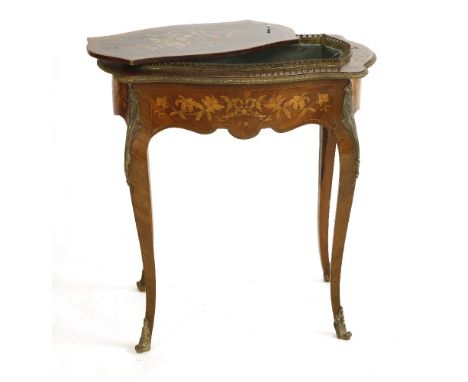 A Continental marquetry inlaid planter, of oval form and profusely decorated with inlaid foliage and applied gilt metal mount