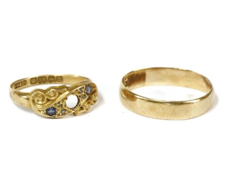 An 18ct gold sapphire and diamond ring, (one stone deficient), 1.82g, and 18ct gold flat section wedding ring, 2.35g