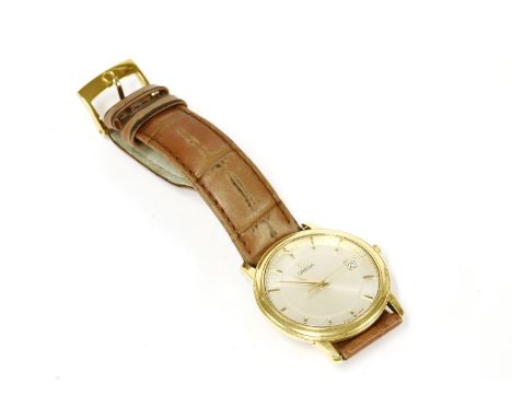 A gentlemen's 18ct gold Omega automatic strap watch, silvered dial, raised gilt batons and sword hands, date and centre secon