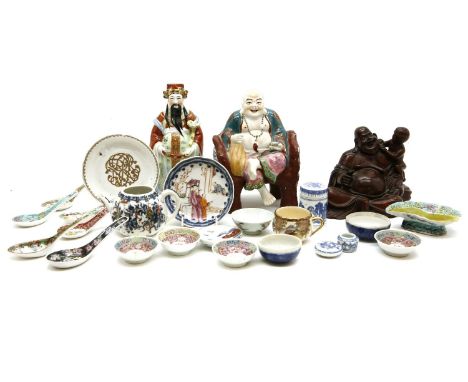 A collection of Oriental items, including ceramic and wooden figures, etc.
