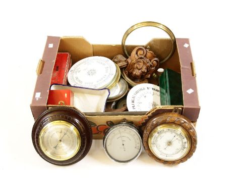 A quantity of various aneroid barometer parts, to include dials, etc.