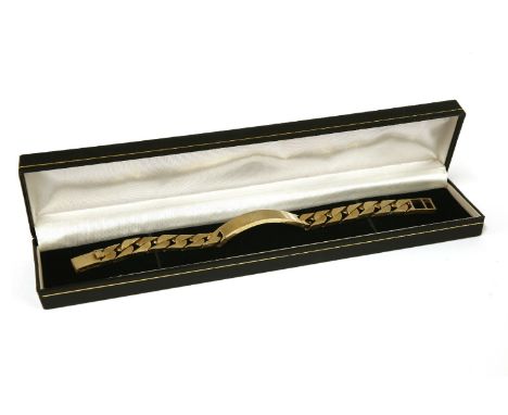 A 9ct gold gentlemen's identity bracelet, plain polished identity bar, curb links and ladder snap clasp, London 197954.32g